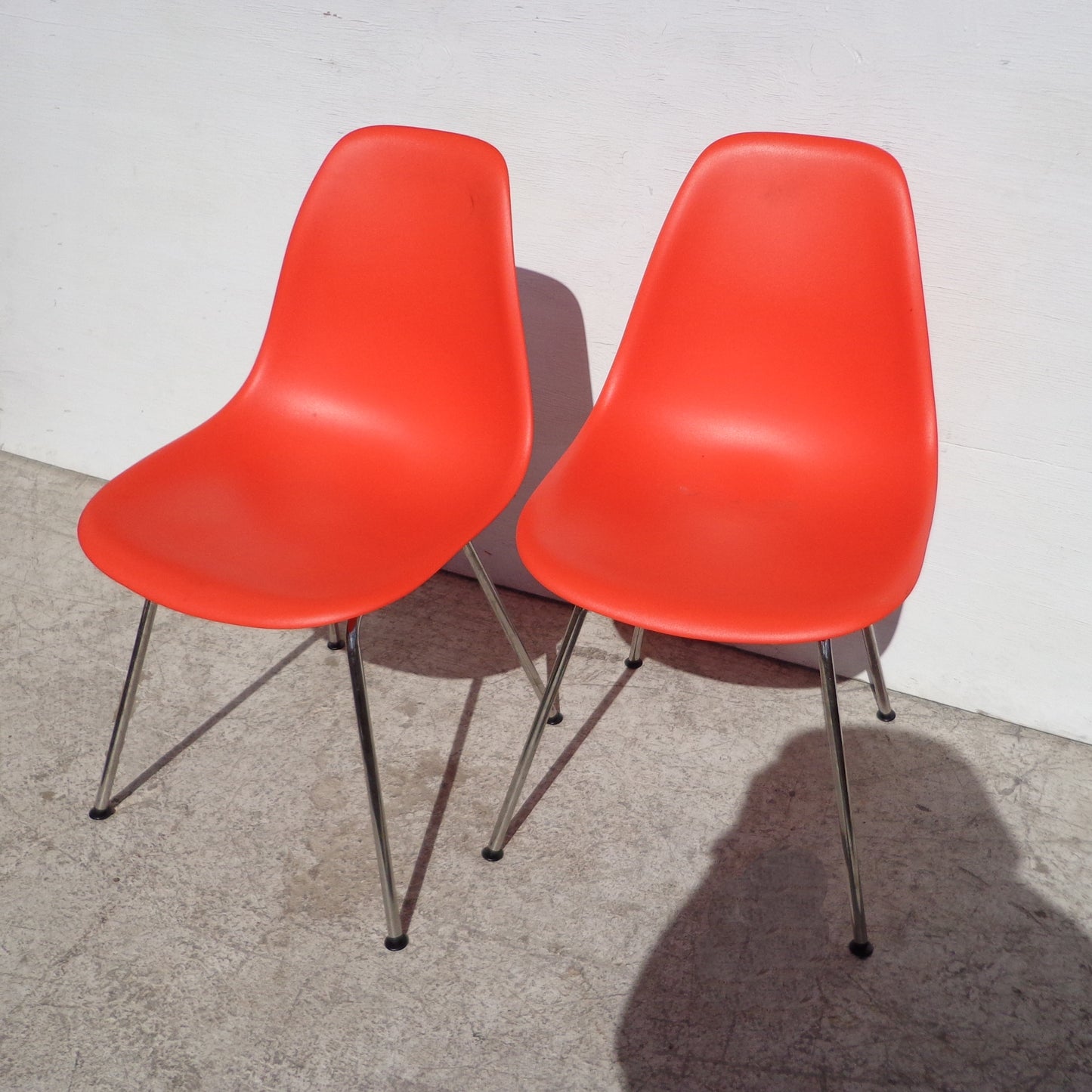 Pair of Vintage Mid Century Herman Miller Eames Orange Side Shell Chairs