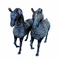 Pair of Asian metal horse sculptures side by side