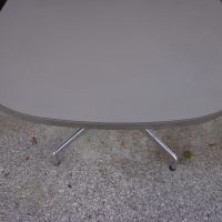 Eames racetrack meeting table with iconic Herman Miller design
