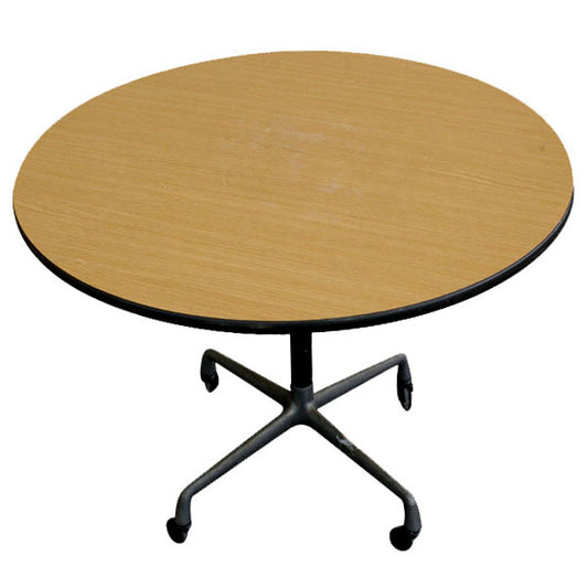 mid-century charm with the 36" Vintage Herman Miller Eames Round Oak Dining Table. Explore timeless design and exceptional craftsmanship in this iconic piece.