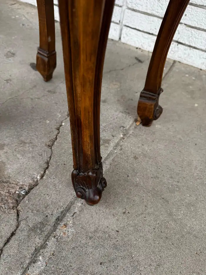 antique French nightstands with ornate inlay and serpentine front