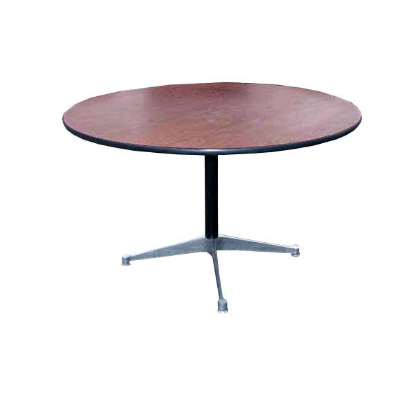 Vintage Round Dining Table by Eames for Herman Miller. Impeccably crafted, this table embodies the essence of mid-century modern design, offering a timeless addition to any dining room.