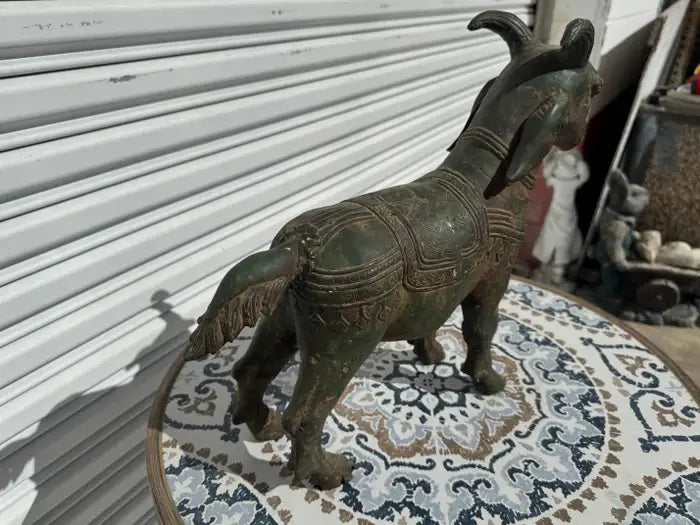 antique style bronze goat figurine detailed craftsmanship