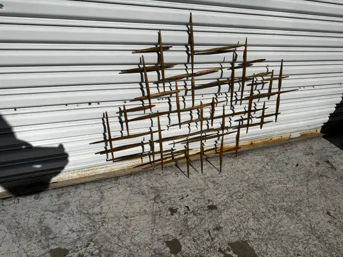 brutalist metal wall decor textured abstract sculpture