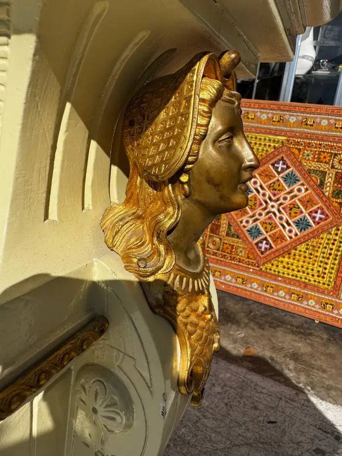 antique inspired pedestal with hand painted and carved surface
