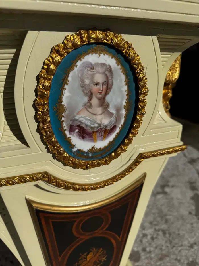 hand painted pedestal with sculpted details and gold accents