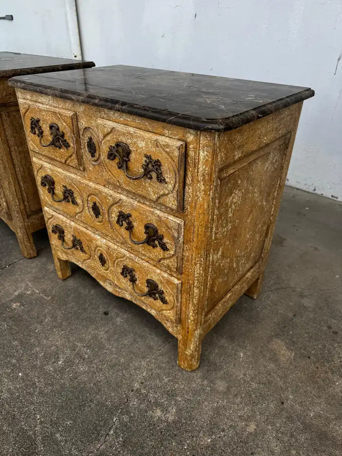 elegant three drawer commodes with marble tops and vintage finish