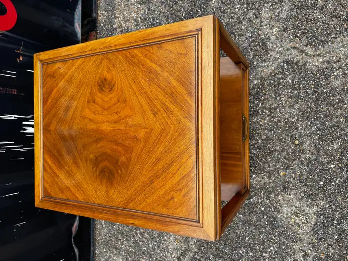 walnut bedside table with drawer and open shelving unit