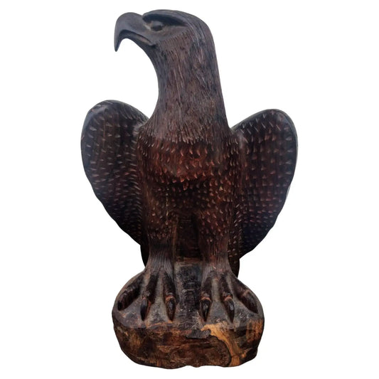 Carved wooden eagle sculpture