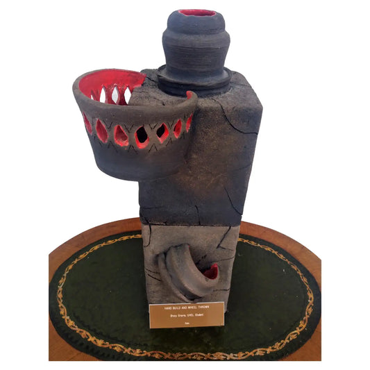 Bruny Graves 2-piece canister-shaped sculpture