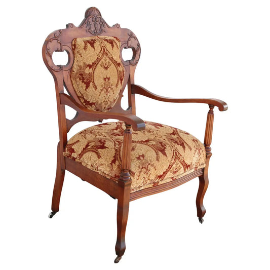 Antique Armchair with upholstery on casters