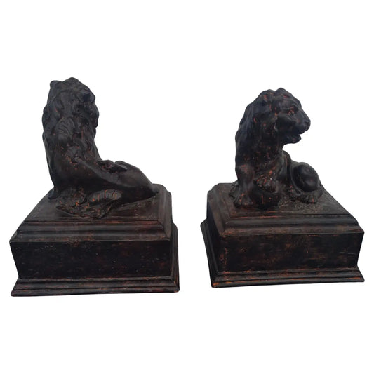 Pair of heavy plaster lion head bookends