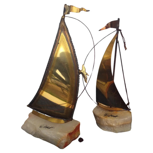 Pair of signed DeMott sailboat sculptures