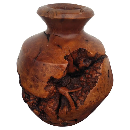 Handcrafted turned wood sculpture with natural grain