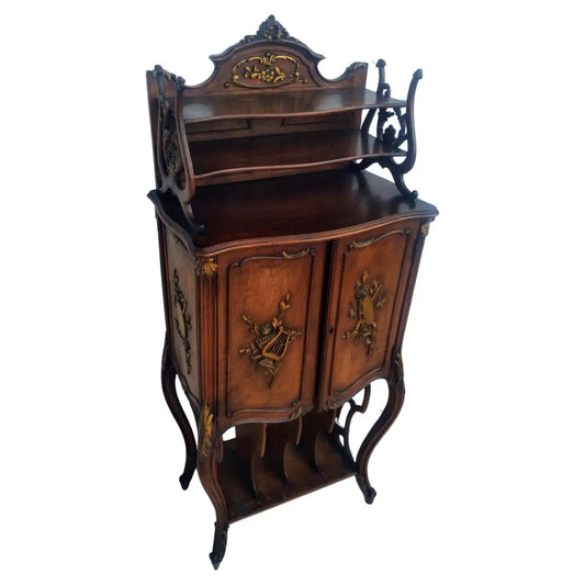 Antique French walnut music cabinet with gilt accents