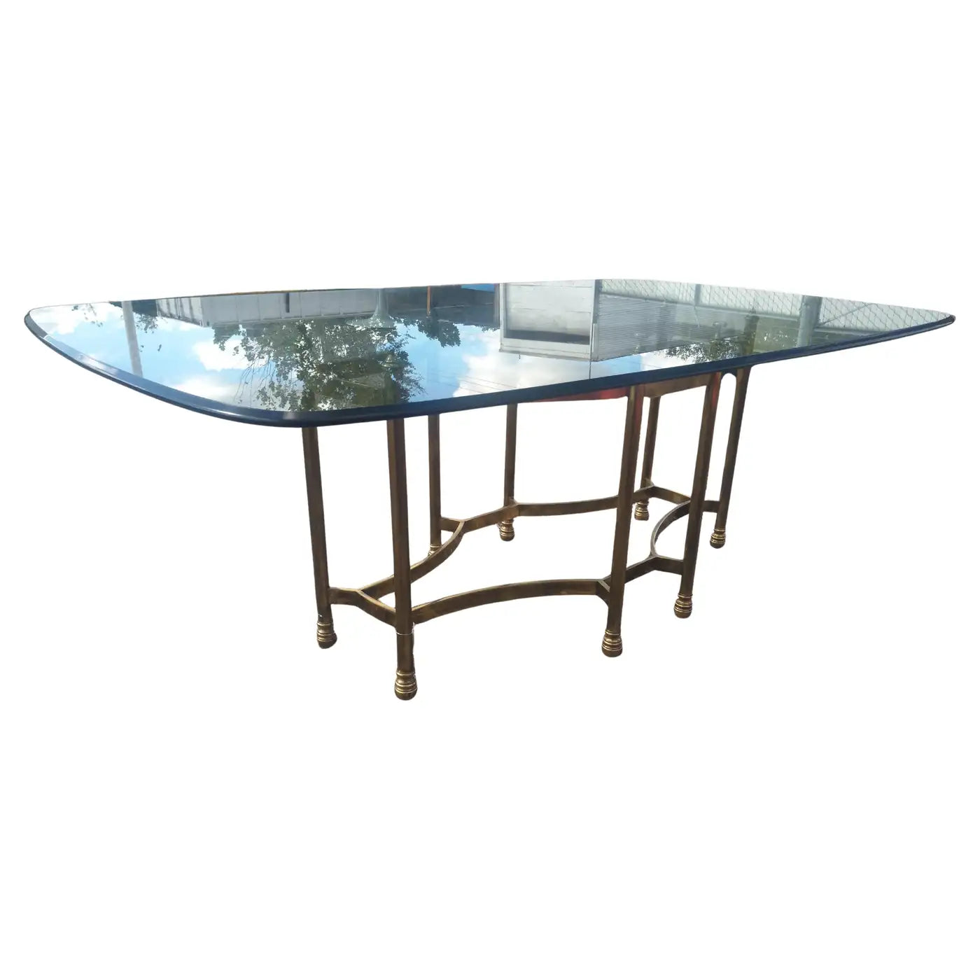 Elegant brass and glass dining table by Maison Bagues