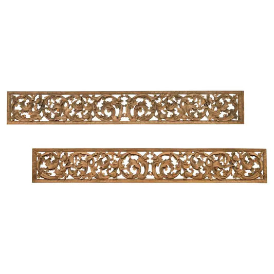 Indonesian carved wood temple panel with scrolling foliage design.