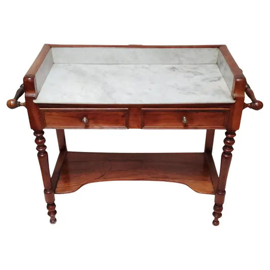 Antique marble top washstand console with carved wood details