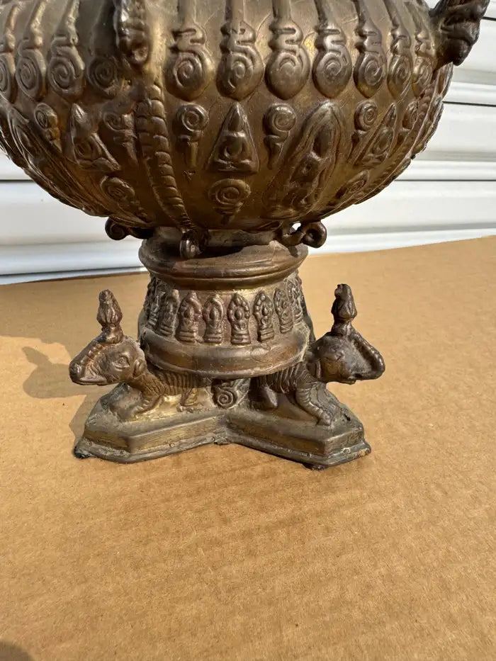intricately carved bronze naga statue asian art piece