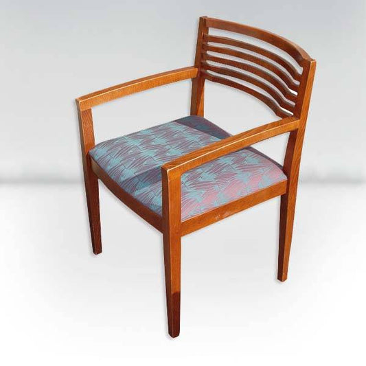 Blue pink Knoll Ricchio Beech Armchairs, featuring a sleek beechwood frame, ergonomic design, and versatile use for dining rooms, offices, or lounges.