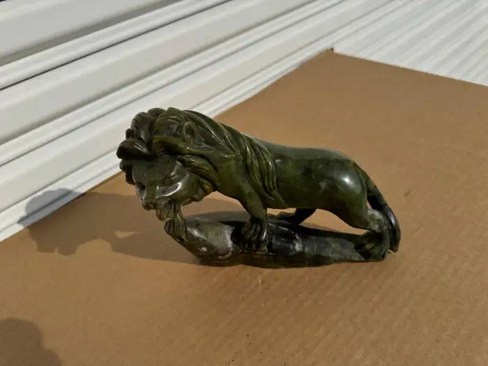 jade stone lion statue detailed carving decorative art