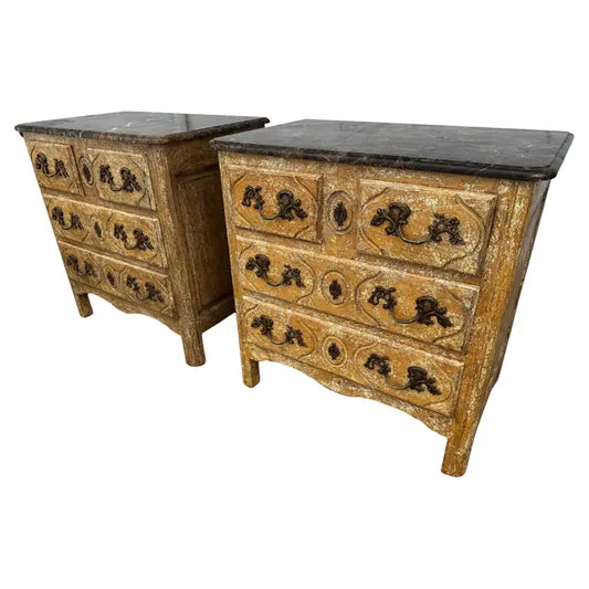 antique style marble top commodes with three drawers and antiqued finish