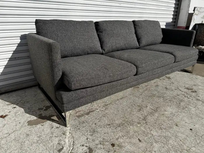 mid century modern grey sofa with feather filled cushions