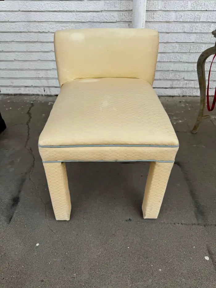 fabric upholstered stool with clean lined parsons frame