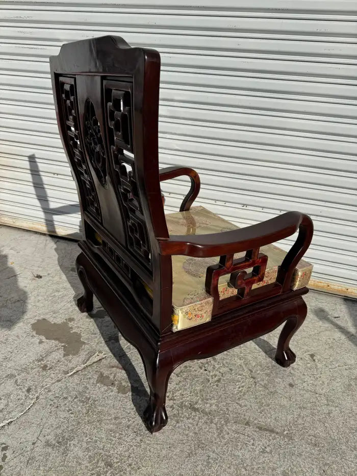 antique accent chair with geometric fretwork backrest