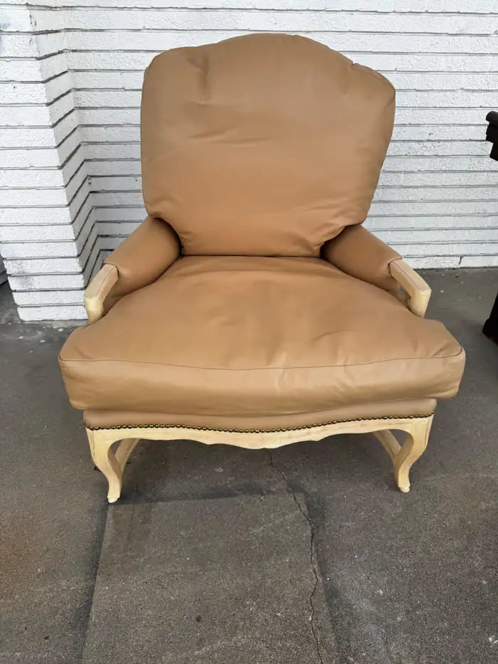 vintage French bergere armchair with leather seat and carved wood