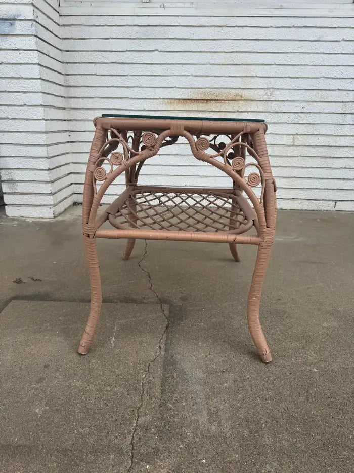handwoven rattan side tables with clear glass surface