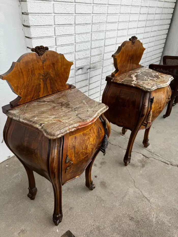 pair of French style nightstands with inlaid wood and shaped marble tops