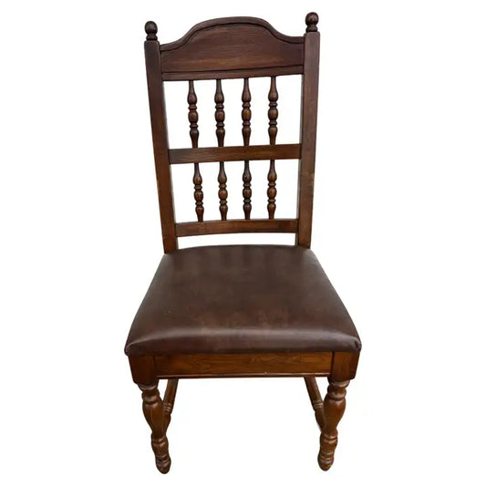 vintage upholstered accent chair with carved wood frame detail