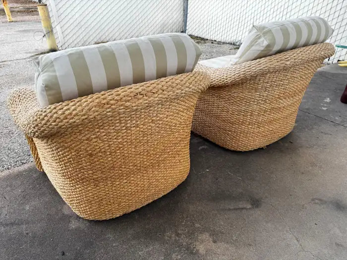 natural wicker lounge chairs with curved frame and cushions