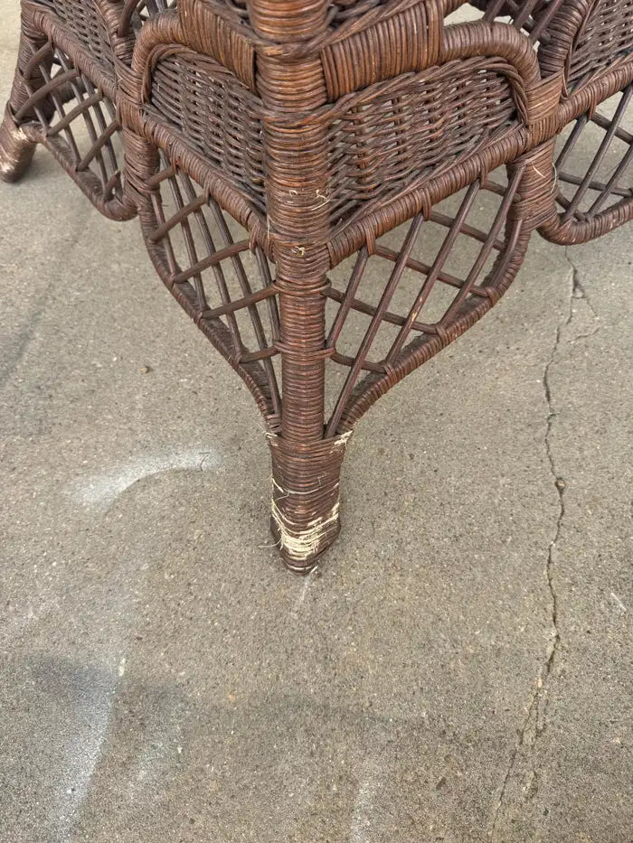 vintage wicker table with glass top and curved frame